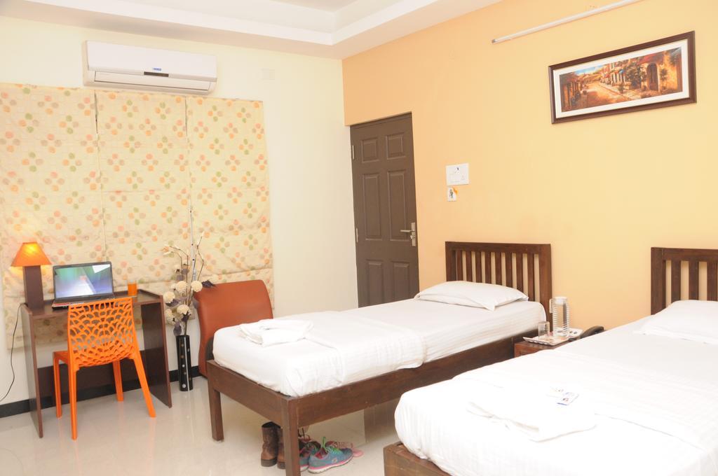 Orange Inn, Manapakkam チェンナイ 部屋 写真