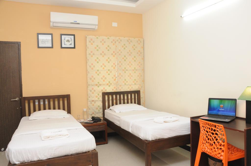 Orange Inn, Manapakkam チェンナイ 部屋 写真