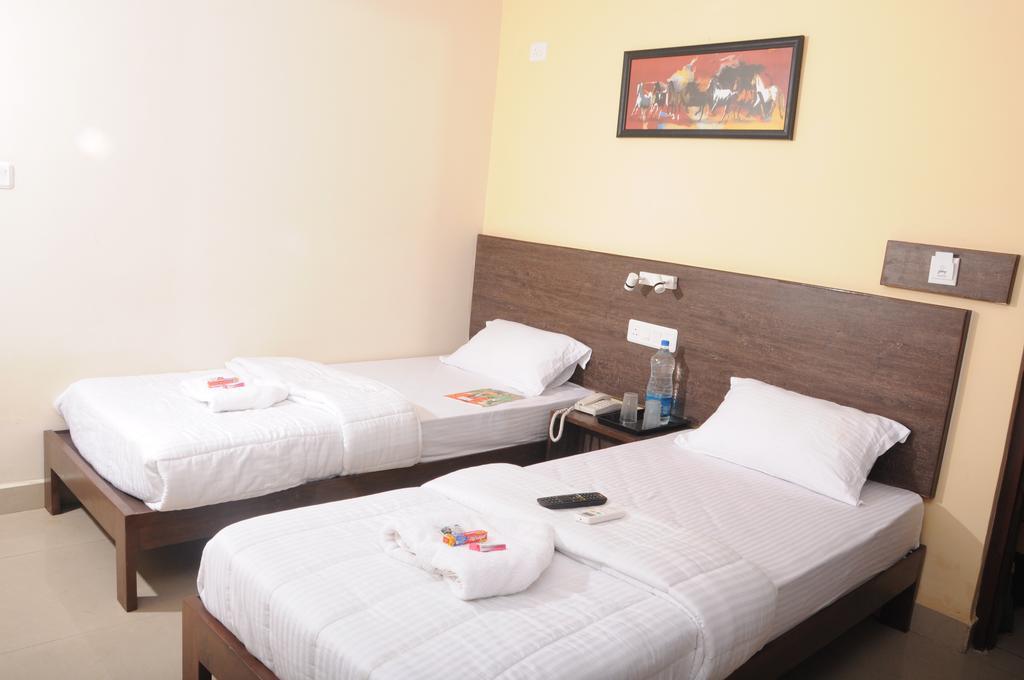 Orange Inn, Manapakkam チェンナイ 部屋 写真